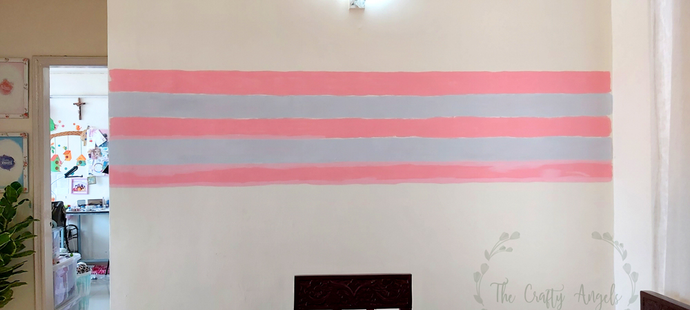DIY Accent wall pink and grey stripes, striped accent wall, wall plates layout